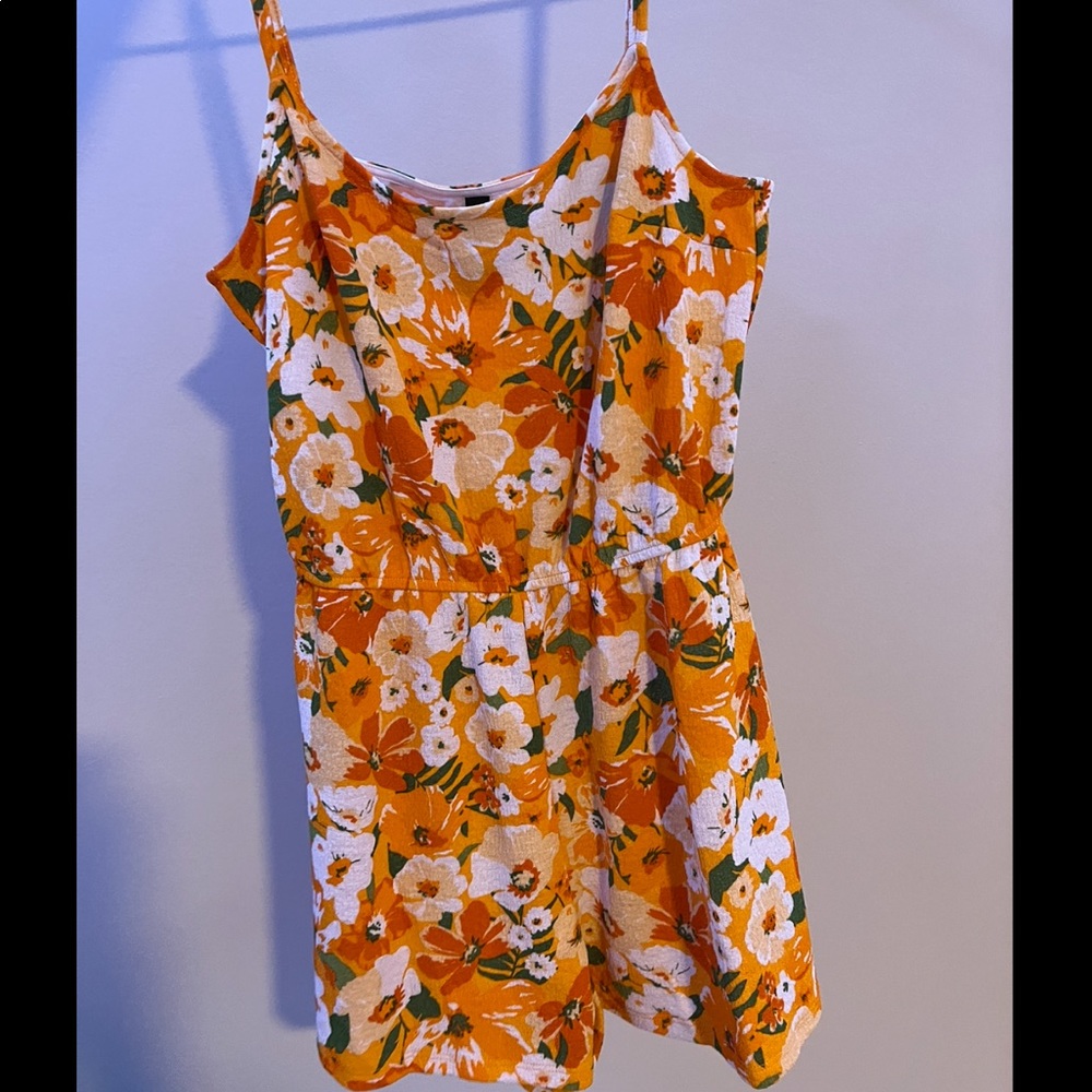 I am selling a Hawaiian style rumpled from H&M, size XS